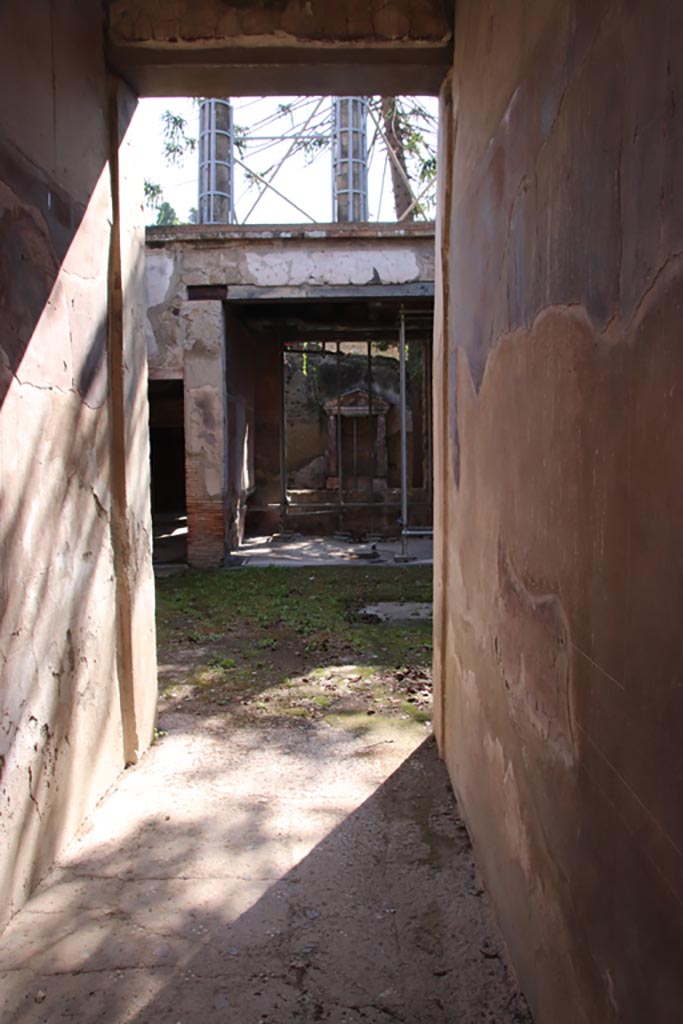 V.5 Herculaneum, October 2022.
Looking east through entrance doorway. Photo courtesy of Klaus Heese.